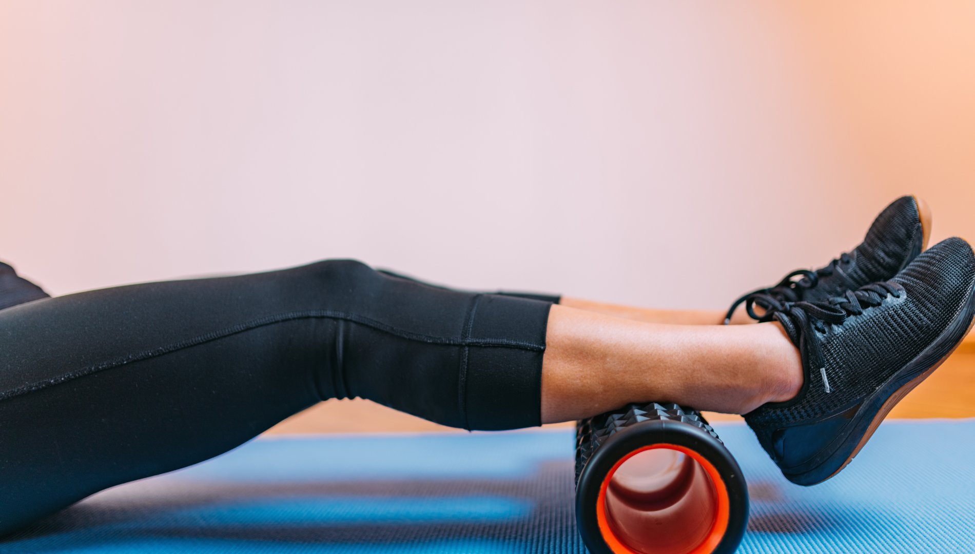 Person foam rolling the calf